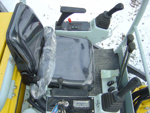 minibagr YC 15 adam pistek
